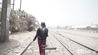 A girl was approached by a guy near the train line in Peru