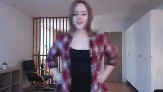 A girl plays with a big dildo, pretending it’s a huge cock in a steamy solo scene