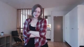 A girl plays with a big dildo, pretending it’s a huge cock in a steamy solo scene