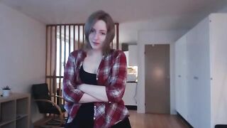 A girl plays with a big dildo, pretending it’s a huge cock in a steamy solo scene