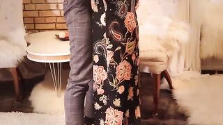 Redhead MILF in long black dress, high heels and stockings gets fucked hard