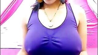 Her nipples are standing and her t-shirt can't contain them