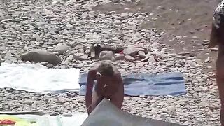 Nudist beauty has sex with her lover on the beach