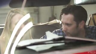 The couple have passionate sex right in the red convertible car