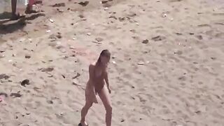 A pair of naturists have fun on the sea