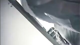 The cam is hidden at the checkout in the store and shoots up skirts
