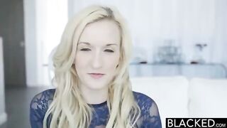 A girl is fucking a black guy while using a vibrator on her clit