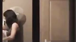 He admires to himself in the mirror, completely naked