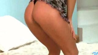 A young Russian lesbian shows her body parts during a stripping video