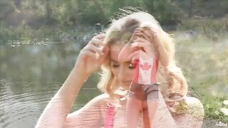 A tender solo masturbation scene of a blonde beauty by the lake