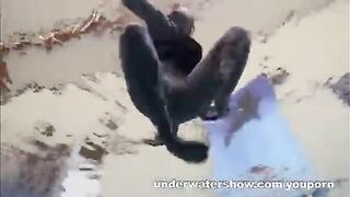 A hot erotic scene with a naked redhead in the pool