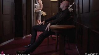 A pretty blonde girl demonstrates her professional skills in this scene