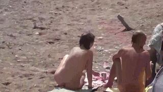 Nude beauties have fun in the sea water
