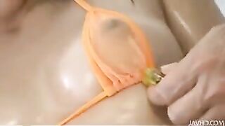 A whale in a bikini is gently prepared for sex, showcasing bondage and toy play