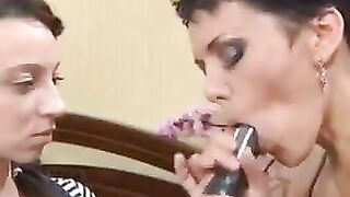 A hot Russian girl practices blowjob with her mom using a strapon, diving deep into sensual lesbian action