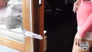 A stunning girl with big tits plays with a dump truck