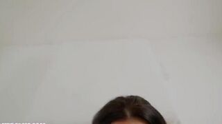Sperm flowing down on the face of a beautiful woman with big tits