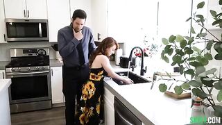 A sexy redhead has sex in the kitchen, her pussy licked with passion