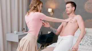 A couple has a heart to heart in the bedroom