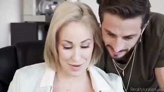 Overworked blondie releases her tension by indulging in office play, much like other daring secretaries