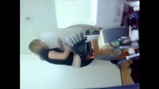 A Kazakh woman is having fun with her colleague in this video