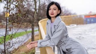A cute little Russian girl is picking up guys on the street