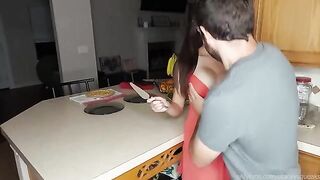You gotta see it, the guy is sucking on her big fake boobs in the kitchen