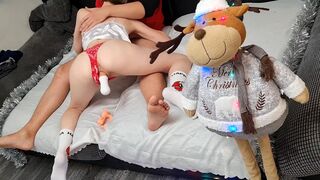 A woman demonstrates to her husband how to please two partners at once