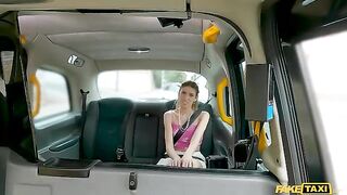 A girl is having fun in the car, moaning with pleasure
