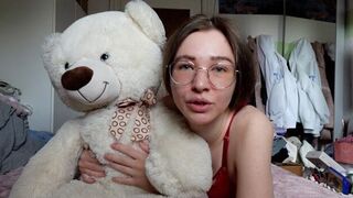 The young girl has a very close relationship with her teddy bear