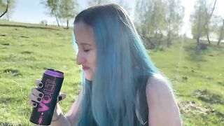 A young Russian girl is having fun outdoors with her classmate