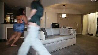 A black girl is getting her big tits squeezed and slapped hard