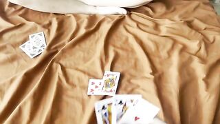 A card game ended, and now the loser has to engage in intimate acts