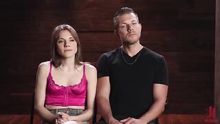 The man has complete power over his brunette girlfriend
