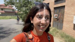 A girl is having sex with her head thrown back