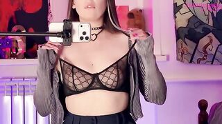 The girl caressed herself with a mirror, embodying the alternative vibe