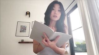 A nerdy girl shares a bed with her Asian step-sister during a study break