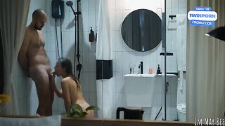 A couple enjoys a steamy shower session with a happy ending