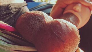 A girl with a silicone mouth works outdoors and sucks cock